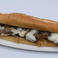 Onions And Pepper Cheesesteak · Chopped steak, grilled onion, grilled green pepper and melted provolone cheese.