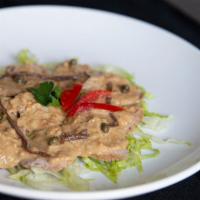 Vitello Tonnato · Gluten free. Sliced, grass-fed veal topped with a sauce of marinated tuna, capers, anchovies...