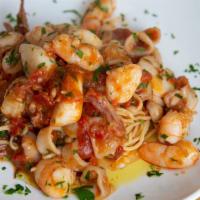 Tagliarini Ai Frutti Di Mare · Homemade egg tagliarini pasta, sauteed with calamari, shrimp and bay scallops in a light tom...