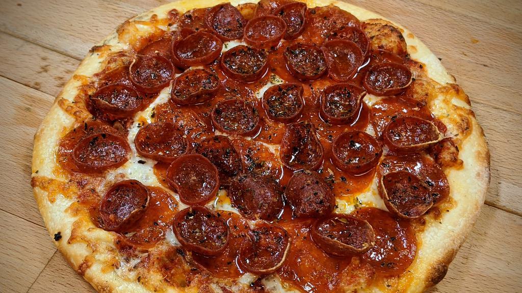 The Super Roni · Topped with pepperoni, cup-and-char pepperoni, and a three cheese blend of Parmesan, Monterrey jack, and Mozzarella cheeses and fresh garlic.