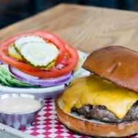 2/3 Lb Cheeseburger · 11 oz. house ground beef patty, cooked to choice of temperature & cheese. Served on a classi...