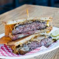 Patty Melt 11 Oz. · 7oz house ground beef patty, choice of temp, Swiss cheese, grilled onions, served on toasted...