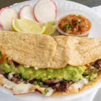 Quesadilla · Choice of Tortilla either, Handmade Corn or Flour, with Cheese, Cilantro, Onion, Guacamole, ...