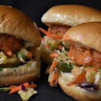 Spicy Chx Sliders · Pickles, slaw, spicy buffalo sauce.
