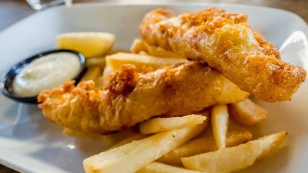 Fish & Chips · Strips, served w/fries & your choice of sauce.