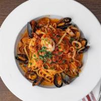 Linguine Pescatore · Pasta with fresh manila clams, shrimp, calamari, and mussels in white wine garlic tomato sau...