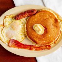 Pancakes Combo · 2 Pancakes, Eggs, Bacon, or Sausage, and you can add Hash brown for an additional charge.