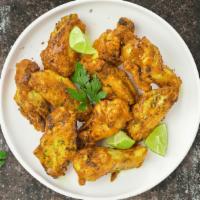 Life Gives You Lemon Pepper Wings · Fresh chicken wings fried until golden brown, and tossed in lemon pepper sauce. Served with ...