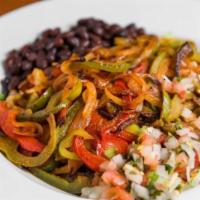 Veggie Fajita Bowl · Grilled veggies, black beans, pico de gallo and guacamole on top of fresh romaine lettuce. W...