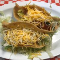 Crispy Taco · Chicken, beef, ground beef or potato with cheese and salsa in a freshly made, hard shell taco.