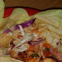 Shrimp  Soft Tacos · Grilled shrimp with cojita cheese, chipotle sauce and cabbage served on corn tortilla.