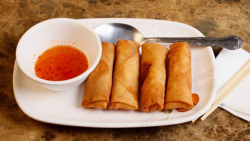 Egg Rolls (4 Pcs) · Crispy deep-fried egg rolls wrapped with cabbage, shredded carrots, ground pork, vermicelli noodles, taro, black mushrooms served with phodera's fish sauce.