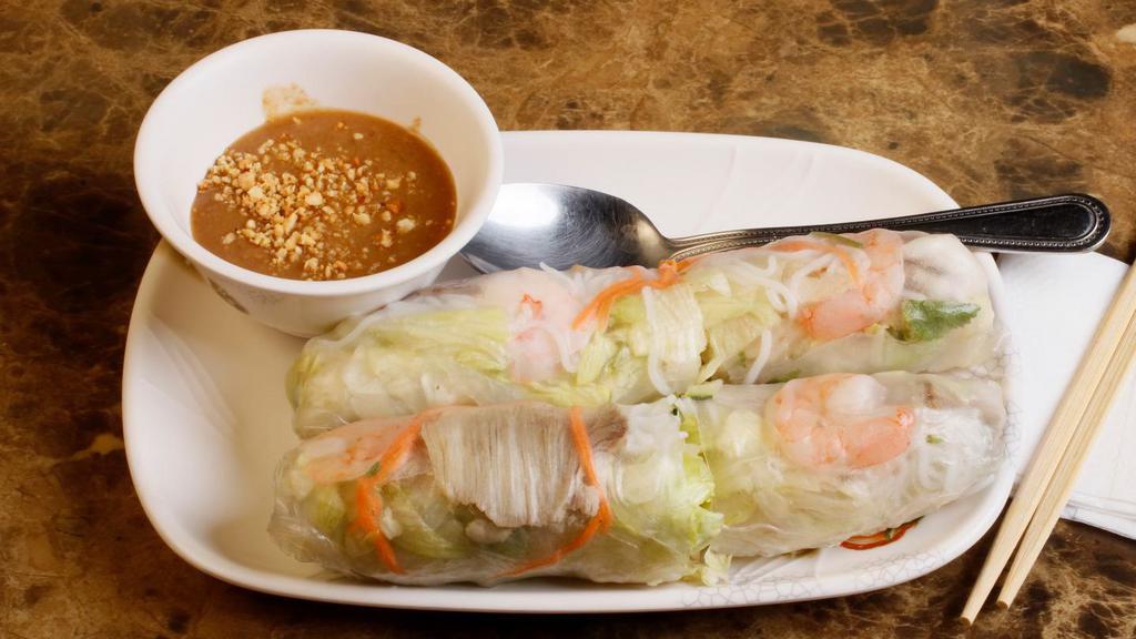 Spring Rolls (2 Pcs)  · Delicate rice paper rolled with carrots, lettuce, pork, and shrimp served with Phodera's peanut sauce.