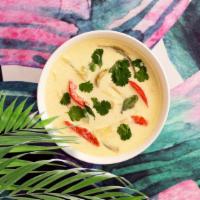Go Green Vegan Green Curry · Going green never tasted so good.  Green curry in coconut milk with tofu, bamboo shoots, bel...