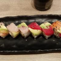 Rainbow Roll · Tuna, salmon, yellowtail, shrimp and avocado on top of california roll.