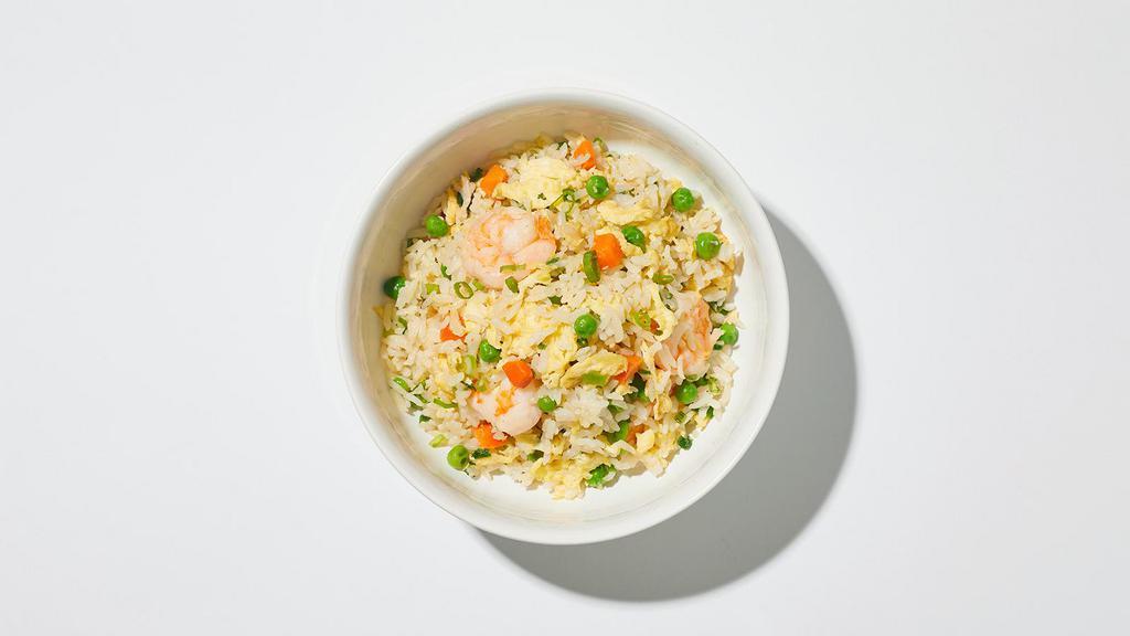 Fried Rice · Authentic fried rice cooked with egg, peas and carrots, green onions.