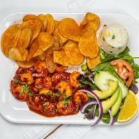 Camarones Endiablados · Shrimp cooked in spicy sauce, served with rice, salad, bread and fresh seasoned slice potato.