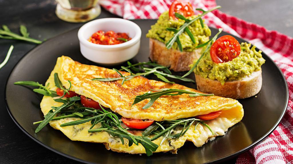 Healthy Omelette · Locally grown avocado, tomatoes, onions, zucchini, and bell pepper.