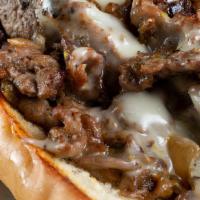 Classic Cheesesteak · Served on an authentic roll. Your choice of a half pound of steak or chicken with white Amer...