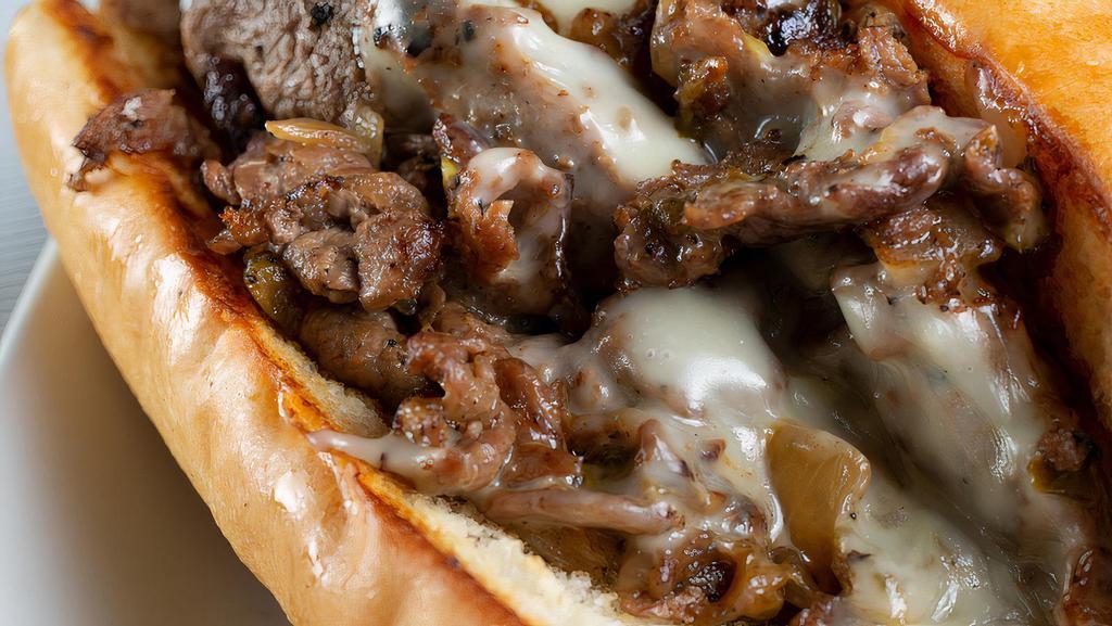 Classic Cheesesteak · Served on an authentic roll. Your choice of a half pound of steak or chicken with white American cheese.