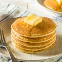 Short Stack · Fluffy, buttery pancakes with golden syrup.