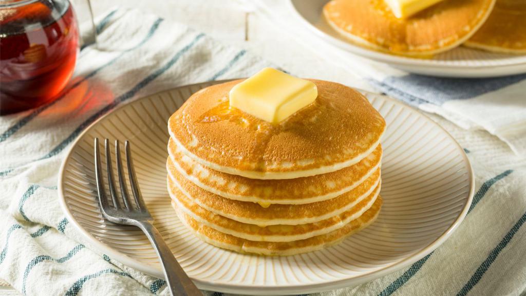 Short Stack · Fluffy, buttery pancakes with golden syrup.
