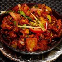 Aloo Gobi · Potato and cauliflower cooked and seasoned with spices.