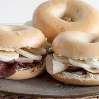 Turkey, Egg, And Cheese Bagel · Turkey, two scrambled eggs and cheese on a bagel.