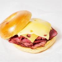 Reuben Bagel · Pastrami, melted swiss, sauerkraut, and thousand island dressing on your choice of bagel.