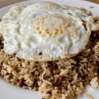 Fried Rice · Fried rice with bacon, sausage, and ham topped with two eggs.