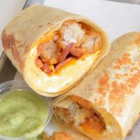 Bacon, Egg And Cheddar Burrito · 3 fresh cracked cage-free scrambled eggs, melted Cheddar cheese, smokey bacon, crispy potato...