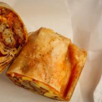 Breakfast Burrito · Eggs, your choice of meat (bacon, sausage, chorizo, or ham), cheese, with salt and pepper ta...