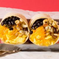 Vegetarian Breakfast Burrito · Breakfast burrito filled with eggs, sauteed onions and peppers, cheese, pico de gallo, rice,...