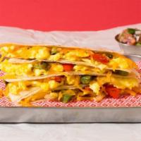 Vegetarian Breakfast Quesadilla · Breakfast quesadilla filled with sauteed onions and peppers, eggs, melted cheese, pico de ga...