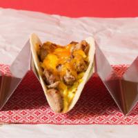 Carnitas Breakfast Tacos (3) · Three breakfast tacos with carnitas, eggs, cheese, and pico de gallo, and served with a side...