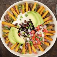 Mexican Sweet Potato Fries · (Vegetarian) Jalapenos, black beans, guacamole, and melted cheese topped on sweet potato fri...