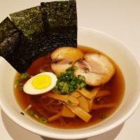 Shoyu Ramen · Soy sauce base Ramen. Contains Chashu, bamboo shoots, hard boiled egg, seaweed, green onion.