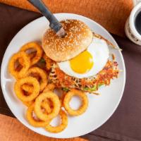 Breakfast Burger · 1/2 pounder topped with hash browns, bacon and an egg, served with a side of onion rings.