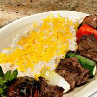 Chenjeh Kebab · Marinated Beef Tender Tenderloin chunks prepared on a skewer and Grilled over open fire BBQ ...