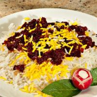 Zereshk Polo With Chicken  · Barberry basmati rice served with oven baked chicken Leg