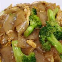 Pad See Iew · Chinese broccoli and carrots stir fried in homemade light brown sauce with a wide rice noodl...