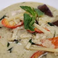Green Curry · Gluten-free, spicy level two. Sweet and spicy green curry paste, coconut milk, egg plant, be...