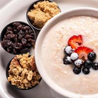 Oatmeal Breakfast · With raisins and brown sugar. Served with fresh fruit.