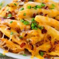 Bacon Cheese Fries · Fresh cut french fries topped with bacon and melted cheese.