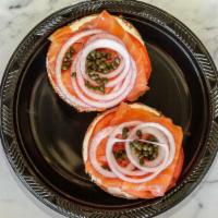 The Manhattan · Favorite. Fresh sliced nova, cream cheese, tomato and red onion and capers on a fresh signat...