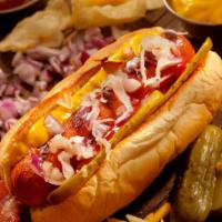 Hot Dog · All beef hot dog with natural casing served on fresh baked village bakery rolls and choice o...