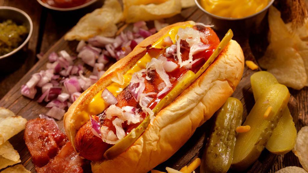 Hot Dog · All beef hot dog with natural casing served on fresh baked village bakery rolls and choice of toppings.