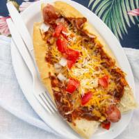 Chili Dog · Hotdog topped with chili, cheese, diced onions, sliced tomatoes.