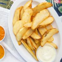 Wedge Cut Fries · Wedge cut fries cooked in a hot air oven.