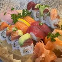 8 Pieces Chef'S Special Roll & 8 Pieces Assorted Sushi · Served with soup and salad for one.